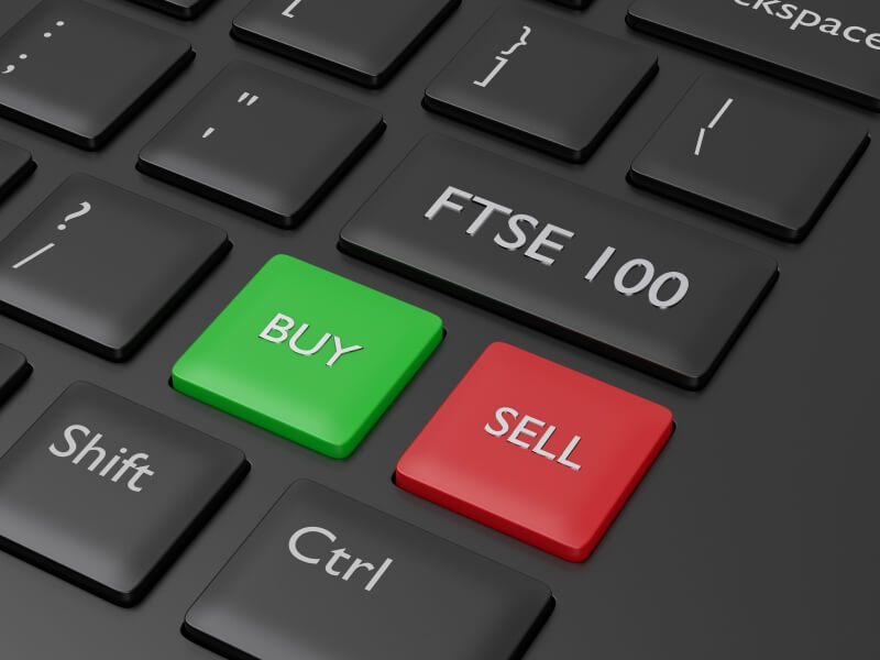 Keyboard buttons "FTSE 100", "BUY", "SELL"