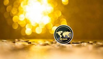 Una criptomoneda Ripple en un fondo dorado. Conoce la XRP predicción del 2023.